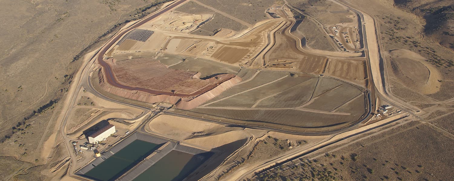 Aerial view of the Emigrant Mine heap leach pad, lined process ponds and haul roads under construction in the Nevada high desert